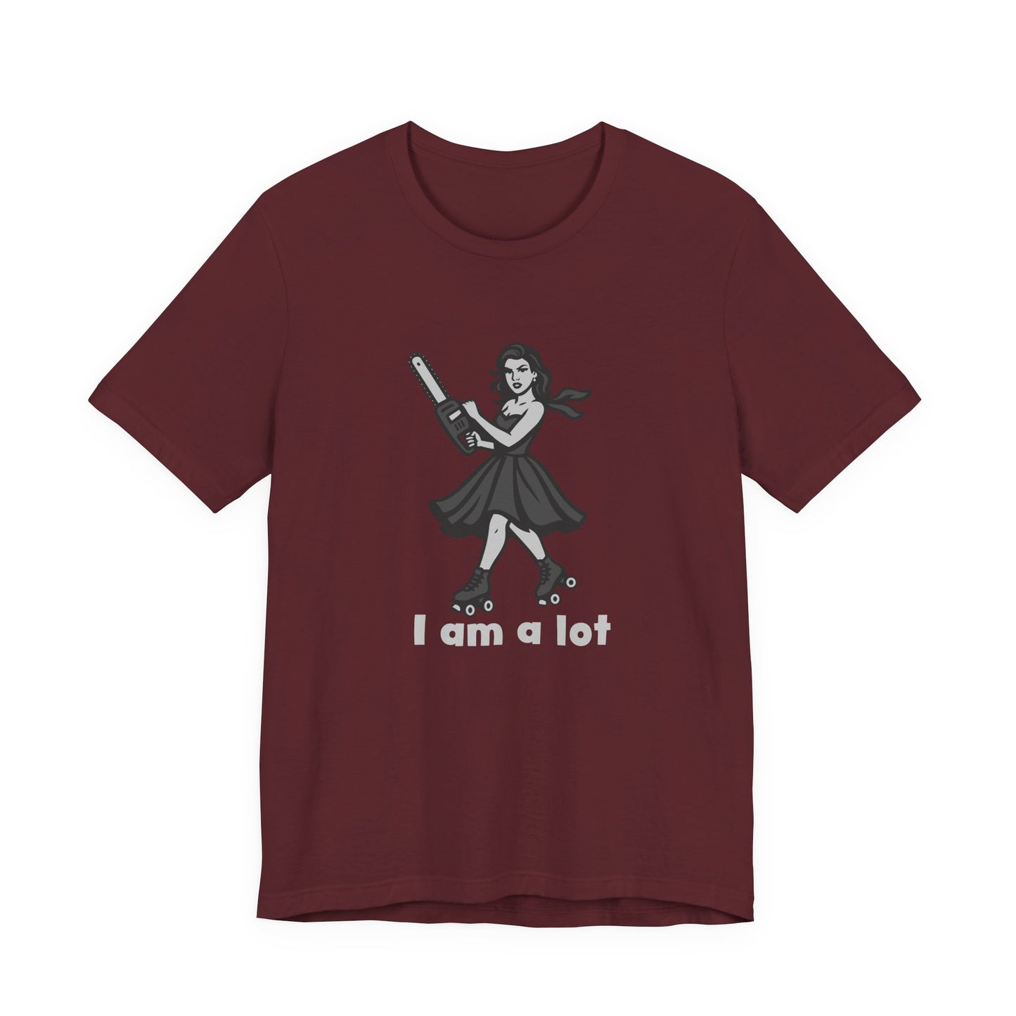 I Am a Lot Shirt – Fierce Skater Girl with Chainsaw in Dark Theme Retro Cartoon Style. Unisex Jersey Short Sleeve Tee