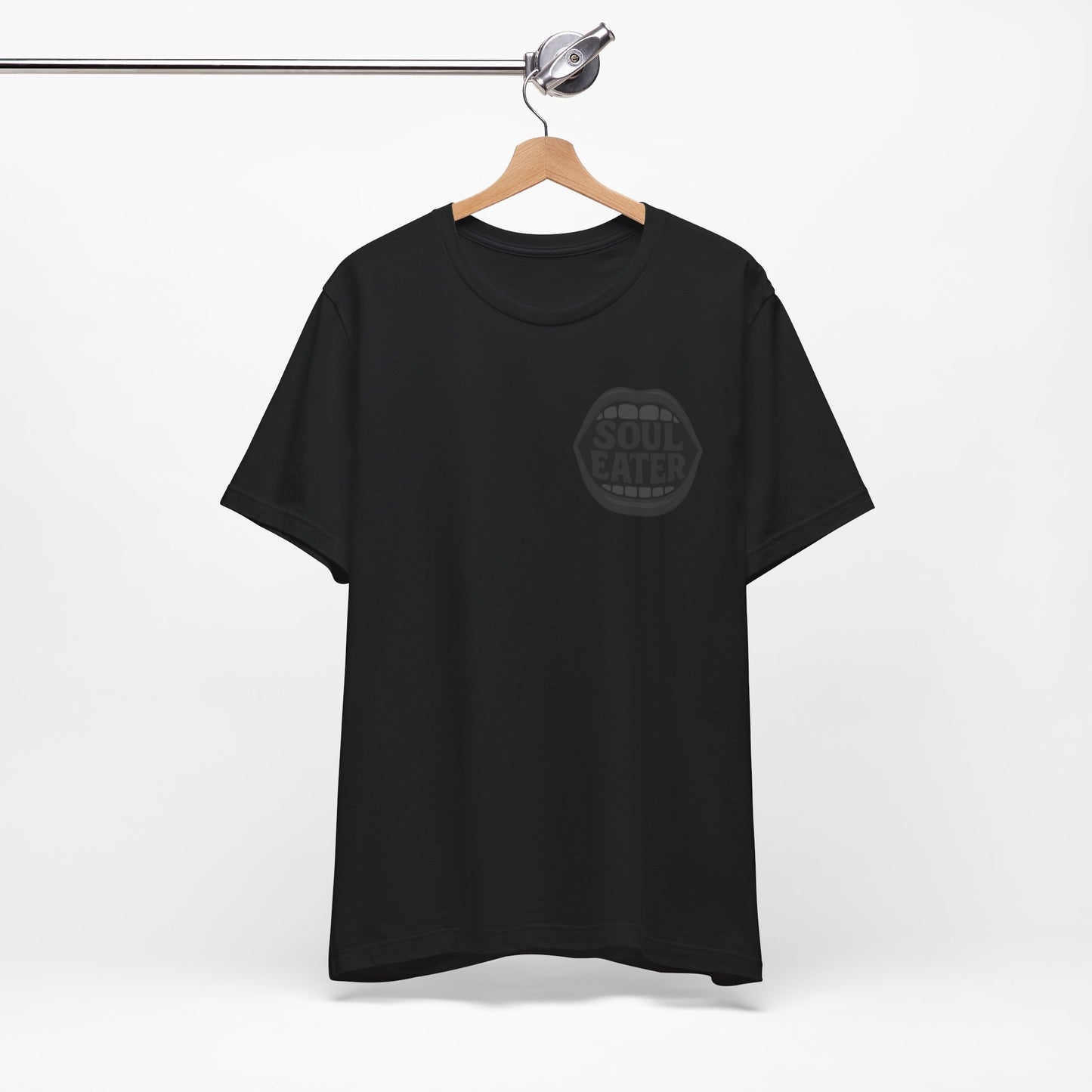 Soul Eater Mouth Graphic T-Shirt – Dark Theme Grayscale Teeth Typography on Black Tee with Horror Vibes and Modern Ghost Effect. Unisex Jersey Short Sleeve Tee