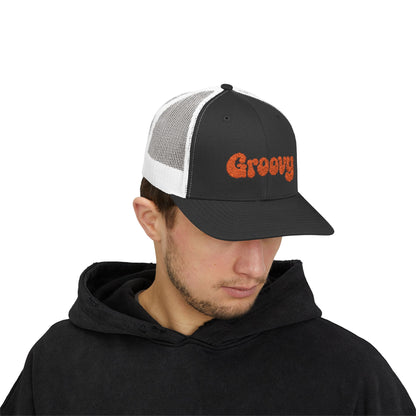 Groovy Trucker Hat – Retro Embroidered Hat with 70s Style Font for Funky Vibes, Chill Days, and Vintage Cool. Orange Letters