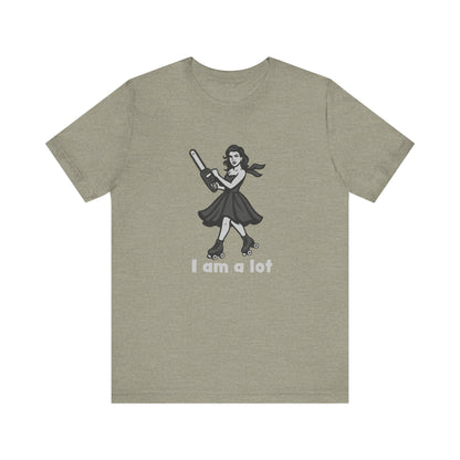 I Am a Lot Shirt – Fierce Skater Girl with Chainsaw in Dark Theme Retro Cartoon Style. Unisex Jersey Short Sleeve Tee