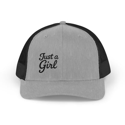 Just a Girl Trucker Hat – Minimalist Script Hat with Bold Feminine Energy and Classic Style. Black Letters