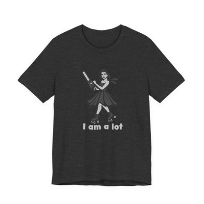 I Am a Lot Shirt – Fierce Skater Girl with Chainsaw in Dark Theme Retro Cartoon Style. Unisex Jersey Short Sleeve Tee