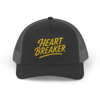 Heartbreaker Trucker Hat – Bold Baseball Hat with Retro Script and Broken Heart Design for Confident Rule-Breakers. Yellow Letters