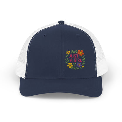 Just a Girl Trucker Hat – Colorful Floral Text Hat with Bold Feminine Style and Summer Vibes