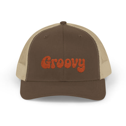 Groovy Trucker Hat – Retro Embroidered Hat with 70s Style Font for Funky Vibes, Chill Days, and Vintage Cool. Orange Letters