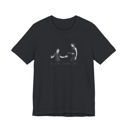 A Girl’s Gotta Eat Shirt – Dark Theme Heartbreaker Tee Featuring a No-Nonsense Queen with Zero Regrets. Unisex Jersey Short Sleeve Tee