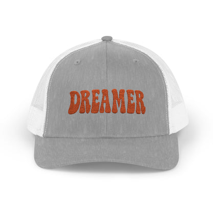 Dreamer Trucker Hat – Embroidered Minimalist Script Hat for Visionaries, Creatives, and Chill Daydreamers. Orange Letters