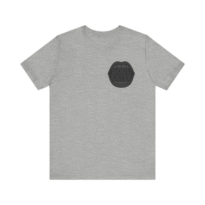 Soul Eater Mouth Graphic T-Shirt – Dark Theme Grayscale Teeth Typography on Black Tee with Horror Vibes and Modern Ghost Effect. Unisex Jersey Short Sleeve Tee