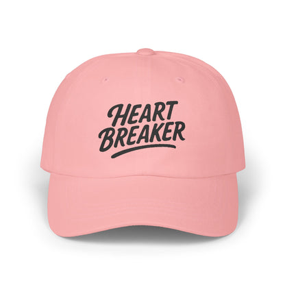 Heartbreaker Embroidered Classic Dad Hat – Bold Baseball Hat with Retro Script and Broken Heart Design for Confident Rule-Breakers. Black Letters