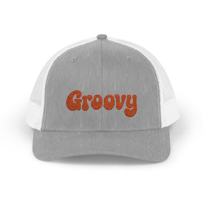 Groovy Trucker Hat – Retro Embroidered Hat with 70s Style Font for Funky Vibes, Chill Days, and Vintage Cool. Orange Letters