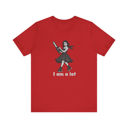 I Am a Lot Shirt – Fierce Skater Girl with Chainsaw in Dark Theme Retro Cartoon Style. Unisex Jersey Short Sleeve Tee