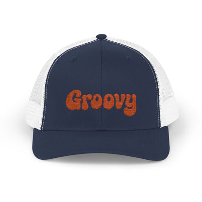 Groovy Trucker Hat – Retro Embroidered Hat with 70s Style Font for Funky Vibes, Chill Days, and Vintage Cool. Orange Letters