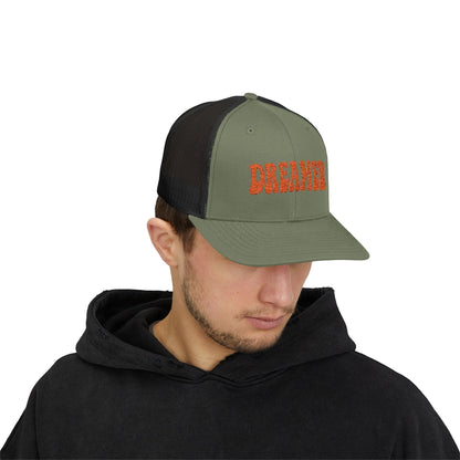 Dreamer Trucker Hat – Embroidered Minimalist Script Hat for Visionaries, Creatives, and Chill Daydreamers. Orange Letters