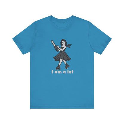 I Am a Lot Shirt – Fierce Skater Girl with Chainsaw in Dark Theme Retro Cartoon Style. Unisex Jersey Short Sleeve Tee