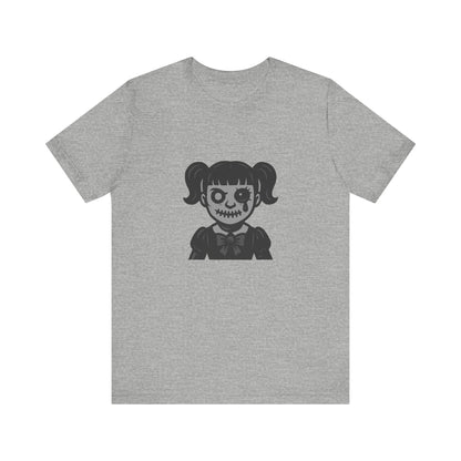 Scary Doll Graphic T-Shirt – Dark Theme Grayscale Creepy Cute Girl Design on Black Tee with Haunted Vibes and Modern Ghost Effect. Unisex Jersey Short Sleeve Tee