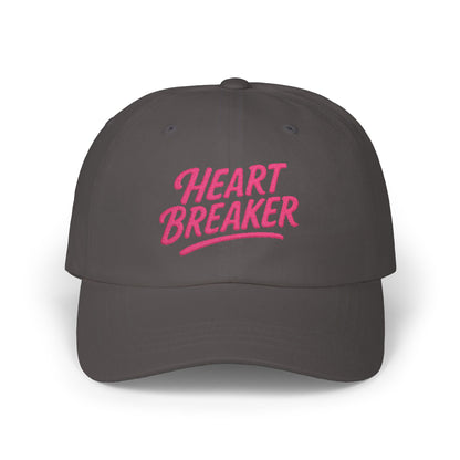Heartbreaker Embroidered Classic Dad Hat – Bold Baseball Hat with Retro Script and Broken Heart Design for Confident Rule-Breakers. Pink Letters