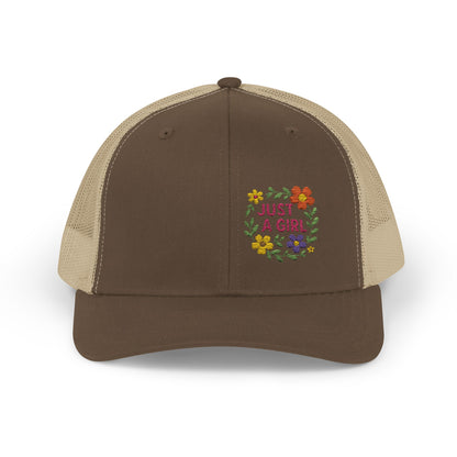 Just a Girl Trucker Hat – Colorful Floral Text Hat with Bold Feminine Style and Summer Vibes