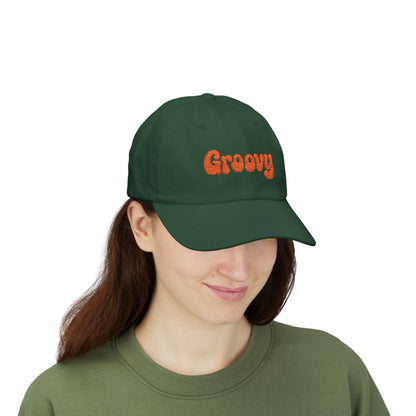 Groovy Classic Dad Hat – Retro Embroidered Hat with 70s Style Font for Funky Vibes, Chill Days, and Vintage Cool. Orange Letters