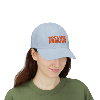 Dreamer Classic Dad Hat – Embroidered Minimalist Script Hat for Visionaries, Creatives, and Chill Daydreamers. Orange Letters
