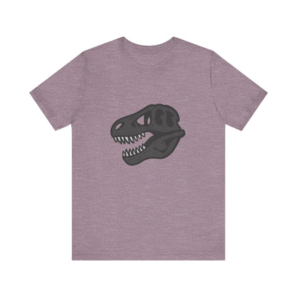 T-Rex Skull Graphic T-Shirt – Dark Theme Grayscale Dinosaur Skeleton Design on Black Tee with Prehistoric Edge and Modern Ghost Effect. Unisex Jersey Short Sleeve Tee