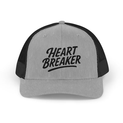 Heartbreaker Trucker Hat – Bold Baseball Hat with Retro Script and Broken Heart Design for Confident Rule-Breakers. Black Letters