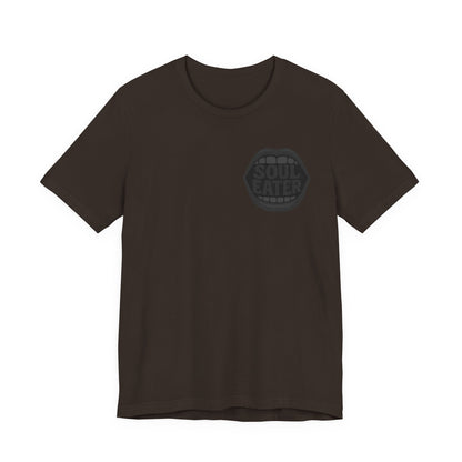 Soul Eater Mouth Graphic T-Shirt – Dark Theme Grayscale Teeth Typography on Black Tee with Horror Vibes and Modern Ghost Effect. Unisex Jersey Short Sleeve Tee