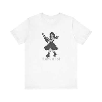 I Am a Lot Shirt – Fierce Skater Girl with Chainsaw in Dark Theme Retro Cartoon Style. Unisex Jersey Short Sleeve Tee