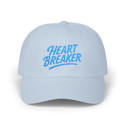 Heartbreaker Embroidered Classic Dad Hat – Bold Baseball Hat with Retro Script and Broken Heart Design for Confident Rule-Breakers. Blue Letters