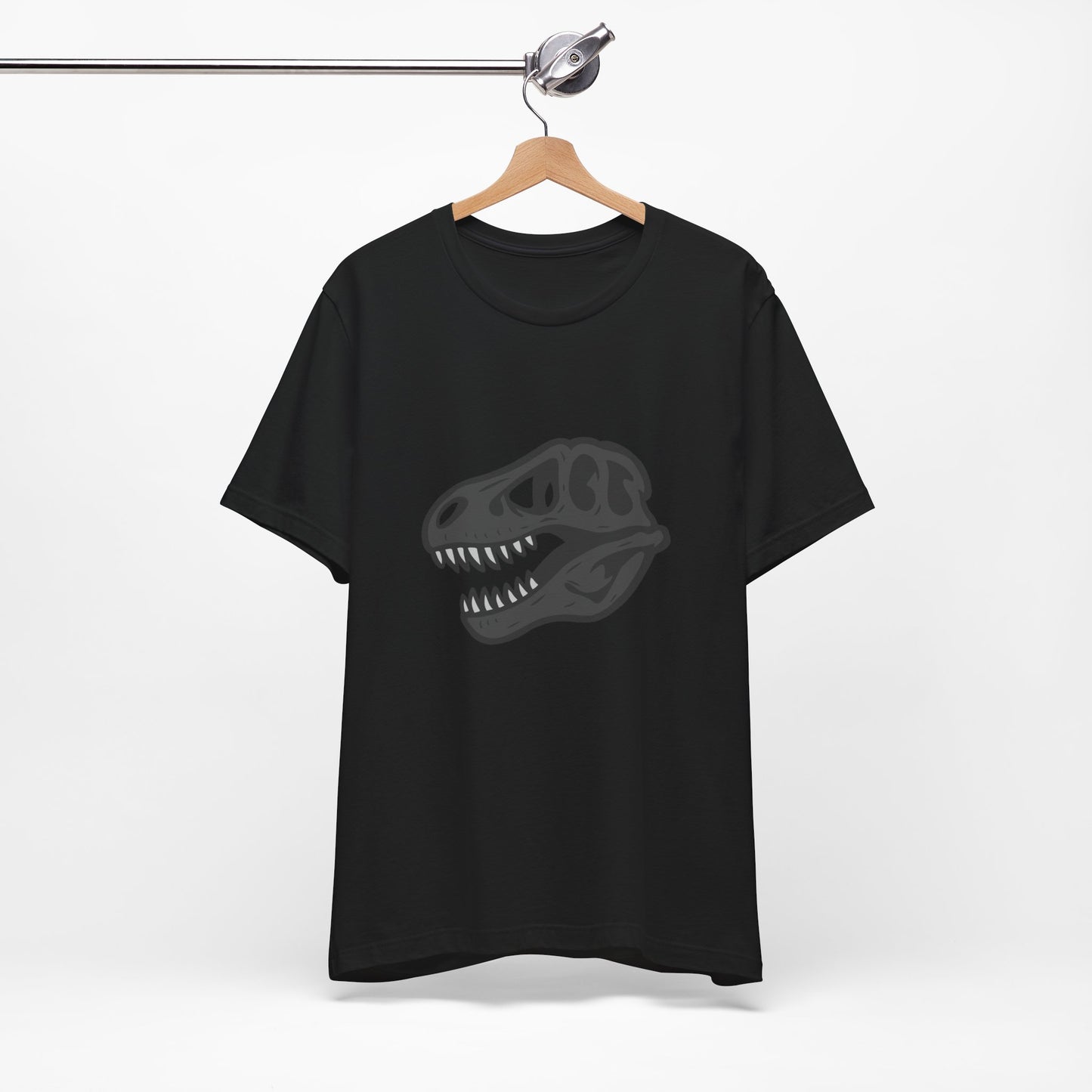 T-Rex Skull Graphic T-Shirt – Dark Theme Grayscale Dinosaur Skeleton Design on Black Tee with Prehistoric Edge and Modern Ghost Effect. Unisex Jersey Short Sleeve Tee