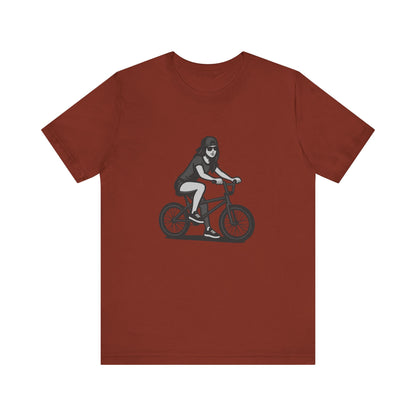 Cool Girl on Bike Graphic T-Shirt – Laid-Back Dark Theme Grayscale Rider Design on Black Tee with Street Style and Subtle Modern Ghost Effect. Unisex Jersey Short Sleeve Tee