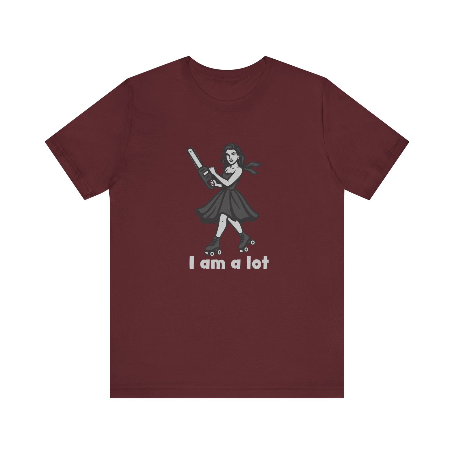 I Am a Lot Shirt – Fierce Skater Girl with Chainsaw in Dark Theme Retro Cartoon Style. Unisex Jersey Short Sleeve Tee