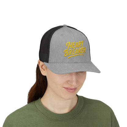 Heartbreaker Trucker Hat – Bold Baseball Hat with Retro Script and Broken Heart Design for Confident Rule-Breakers. Yellow Letters