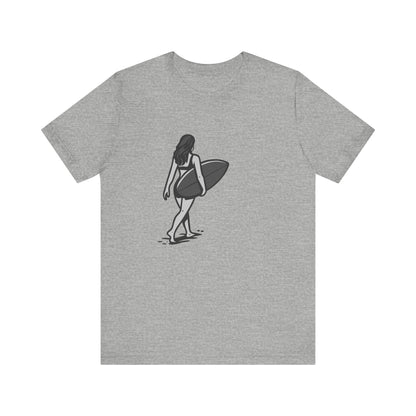 Surfer Girl Walking Graphic T-Shirt – Dark Theme Grayscale Beach Scene on Black Tee with Coastal Calm and Modern Ghost Effect. Unisex Jersey Short Sleeve Tee