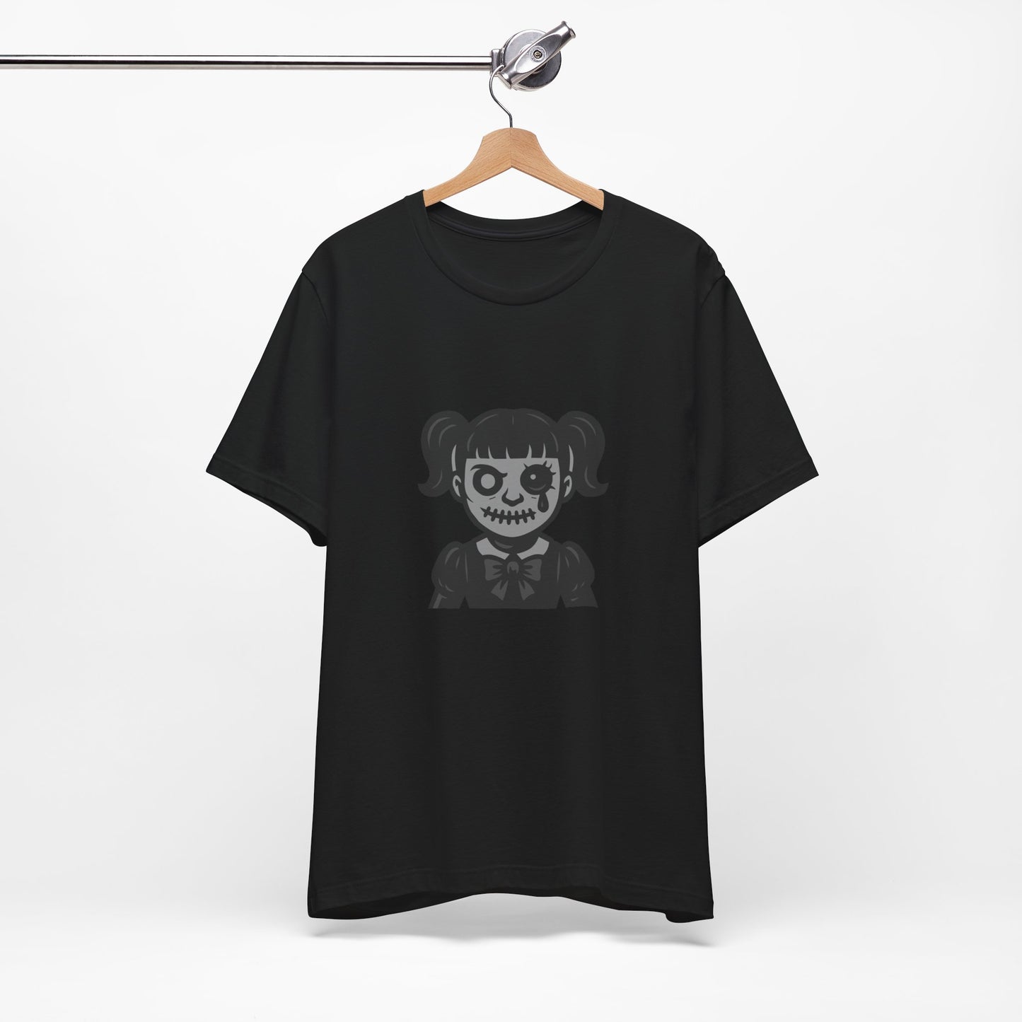Scary Doll Graphic T-Shirt – Dark Theme Grayscale Creepy Cute Girl Design on Black Tee with Haunted Vibes and Modern Ghost Effect. Unisex Jersey Short Sleeve Tee