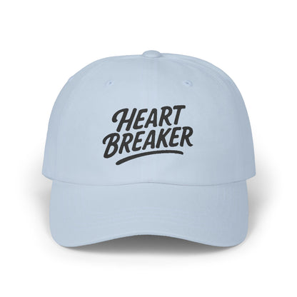 Heartbreaker Embroidered Classic Dad Hat – Bold Baseball Hat with Retro Script and Broken Heart Design for Confident Rule-Breakers. Black Letters