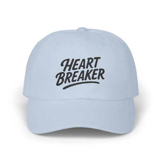 Heartbreaker Embroidered Classic Dad Hat – Bold Baseball Hat with Retro Script and Broken Heart Design for Confident Rule-Breakers. Black Letters