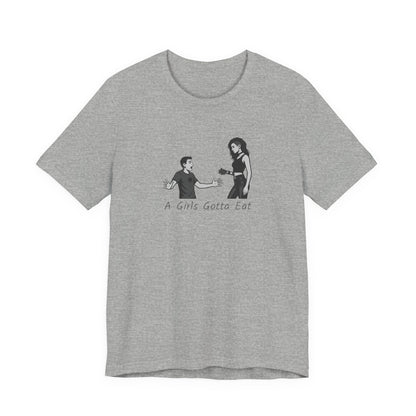 A Girl’s Gotta Eat Shirt – Dark Theme Heartbreaker Tee Featuring a No-Nonsense Queen with Zero Regrets. Unisex Jersey Short Sleeve Tee