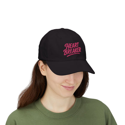 Heartbreaker Embroidered Classic Dad Hat – Bold Baseball Hat with Retro Script and Broken Heart Design for Confident Rule-Breakers. Pink Letters
