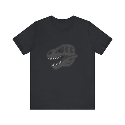 T-Rex Skull Graphic T-Shirt – Dark Theme Grayscale Dinosaur Skeleton Design on Black Tee with Prehistoric Edge and Modern Ghost Effect. Unisex Jersey Short Sleeve Tee