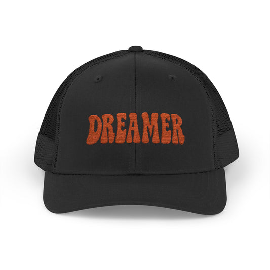 Dreamer Trucker Hat – Embroidered Minimalist Script Hat for Visionaries, Creatives, and Chill Daydreamers. Orange Letters
