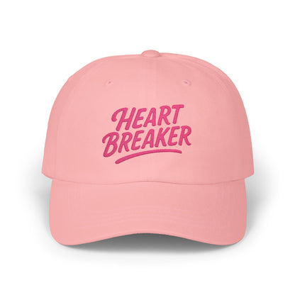 Heartbreaker Embroidered Classic Dad Hat – Bold Baseball Hat with Retro Script and Broken Heart Design for Confident Rule-Breakers. Pink Letters