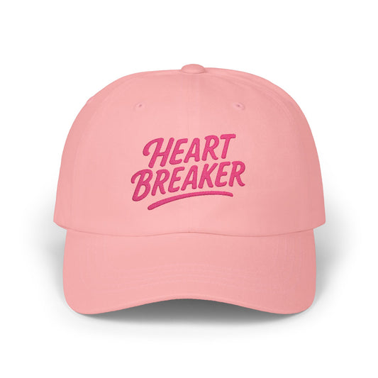 Heartbreaker Embroidered Classic Dad Hat – Bold Baseball Hat with Retro Script and Broken Heart Design for Confident Rule-Breakers. Pink Letters