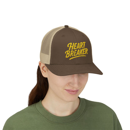 Heartbreaker Trucker Hat – Bold Baseball Hat with Retro Script and Broken Heart Design for Confident Rule-Breakers. Yellow Letters