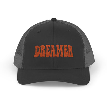 Dreamer Trucker Hat – Embroidered Minimalist Script Hat for Visionaries, Creatives, and Chill Daydreamers. Orange Letters